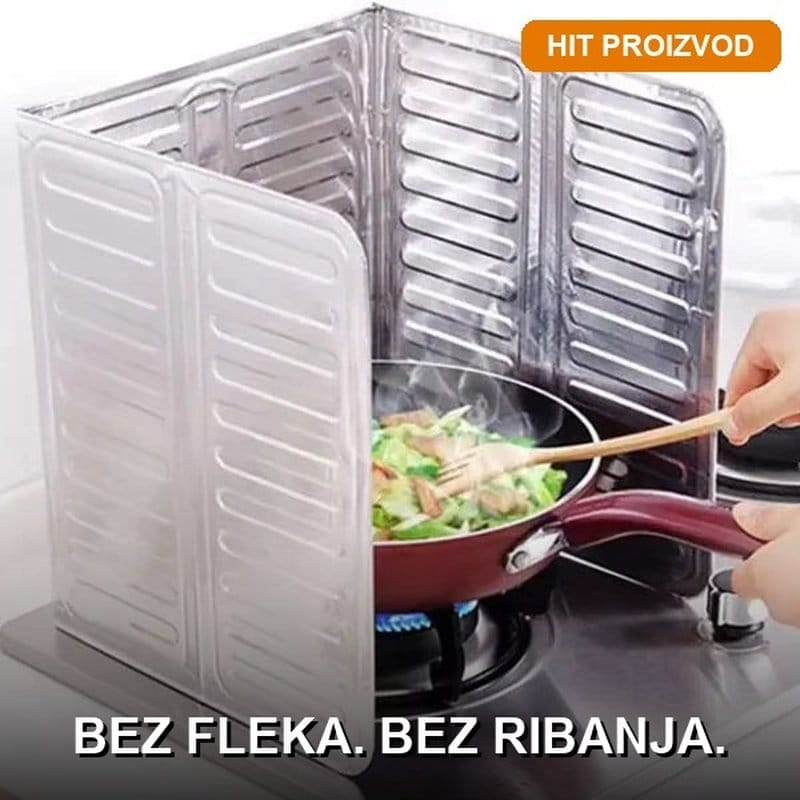 Aluminijumska zaštita od prskanja ulja postavljena uz šporet tokom kuvanja